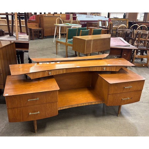 24 - A teak dressing table