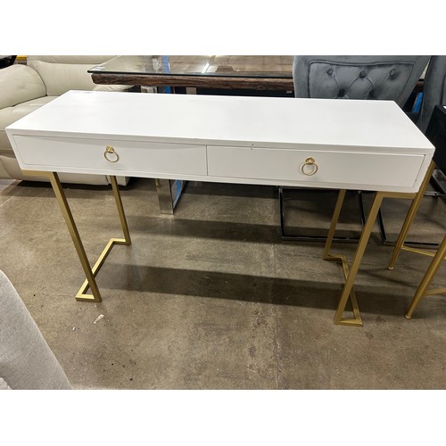 3102 - A white two drawer console table with gold legs