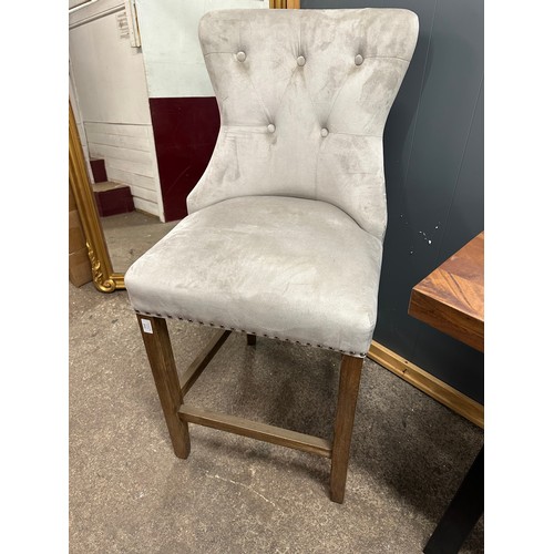 3132 - A taupe velvet bar stool *This lot is subject to VAT