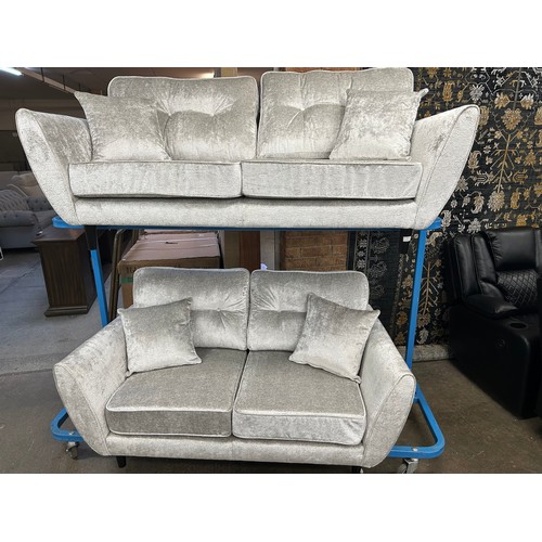 3134 - A 'DFS' zinc 3 seater sofa and 2 seater sofa, (fixed back and foam seats in silver)