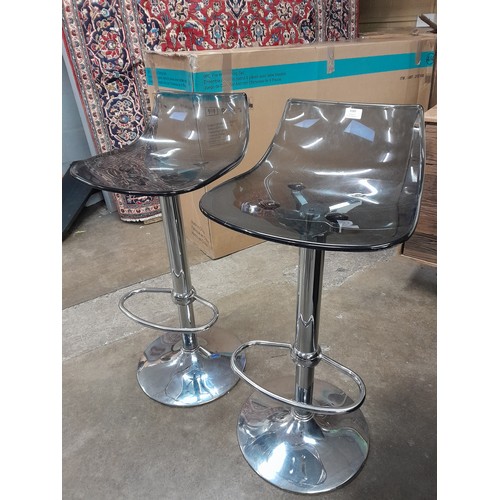 3166 - A pair of smoked black/chrome bar stools