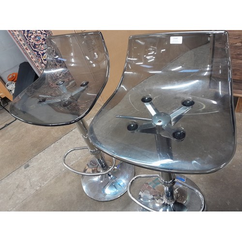 3166 - A pair of smoked black/chrome bar stools