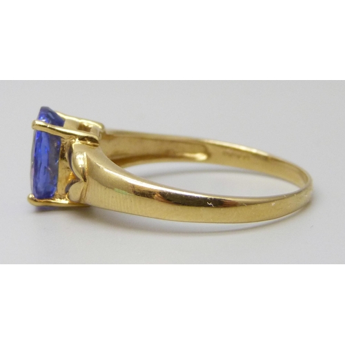 7025 - An 18ct gold Kyanite solitaire ring, 4g, T/U