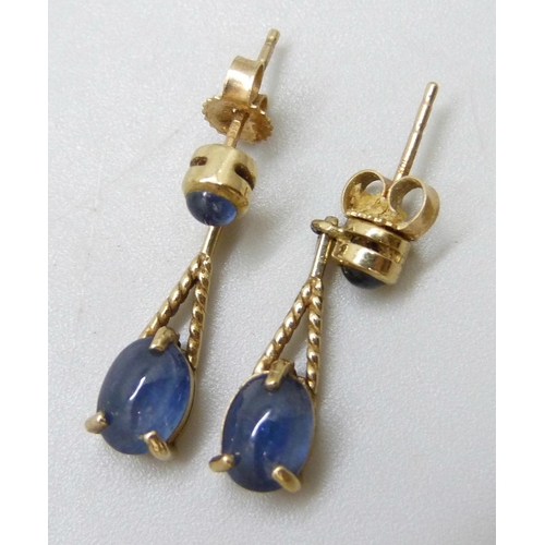 7035 - A pair of 9ct gold drop earrings set with cabochon blue stones, 2.1g, 2.2cm drop