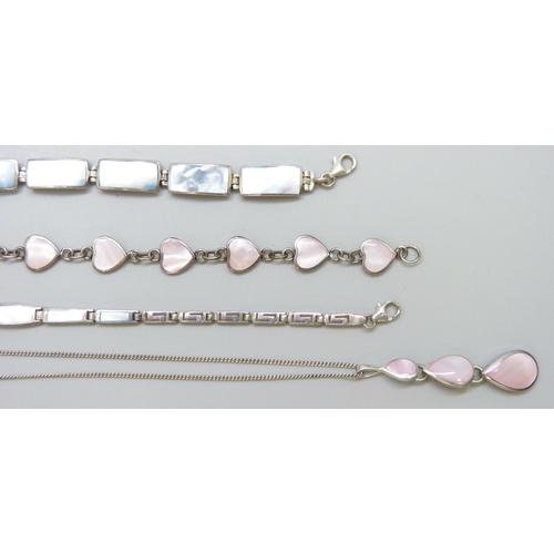 7081 - A collection of silver mother of pearl set jewellery, 82g