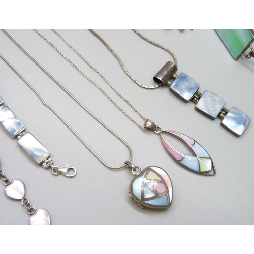 7081 - A collection of silver mother of pearl set jewellery, 82g