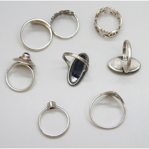 7090 - Eight silver rings including an Ola Gorie butterfly ring, 24g