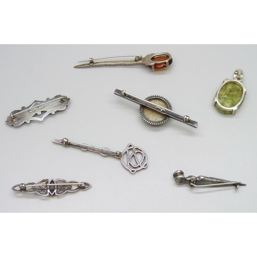 7096 - Seven Scottish and Celtic silver and hardstone brooches, 43g