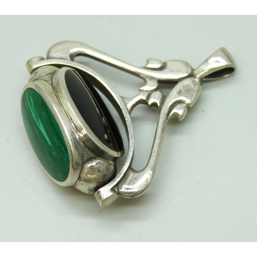 7102 - Two silver pill boxes, one with frog to the lid, and a silver swivel fob inset with onyx, malachite ... 