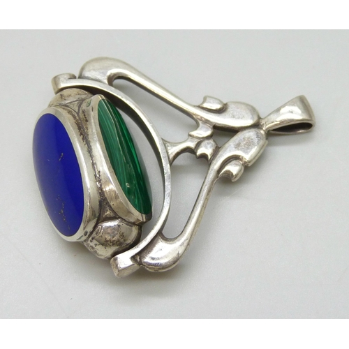 7102 - Two silver pill boxes, one with frog to the lid, and a silver swivel fob inset with onyx, malachite ... 