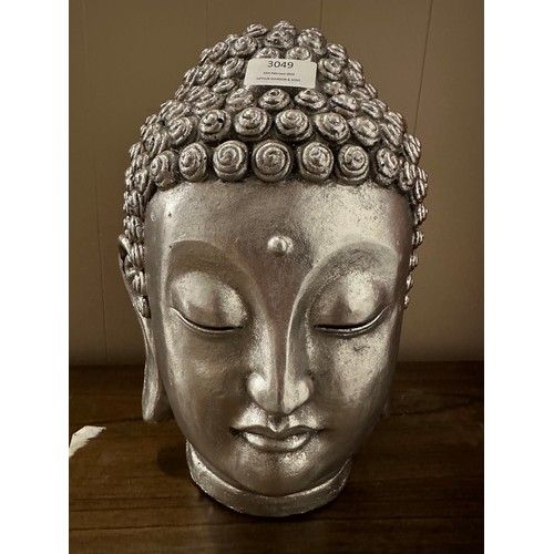 3049 - A large Buddha ornament