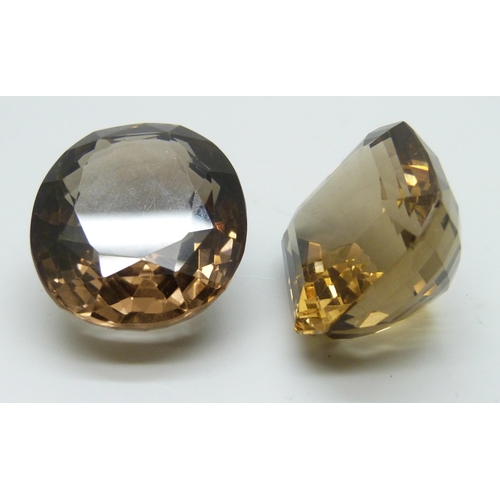 7117 - Two large citrine/smokey quartz, total weight 153 carats