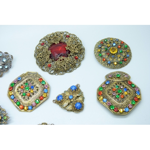 7136 - A collection of Czech style costume jewellery including brooches and a bangle