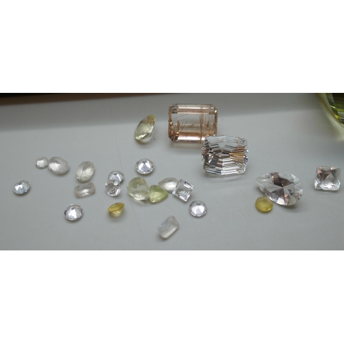 7142 - A collection of quartz gemstones, 197.45ct total, and a gem collector display box