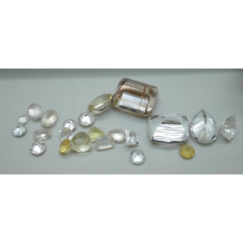 7142 - A collection of quartz gemstones, 197.45ct total, and a gem collector display box