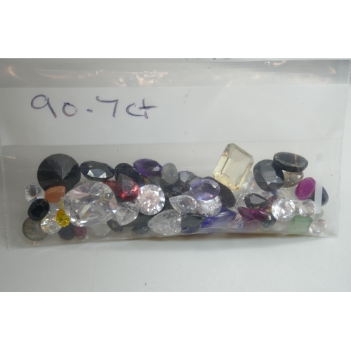 7147 - A quantity of mixed gemstones, 286.7ct in one bag, and 90.7ct in the other