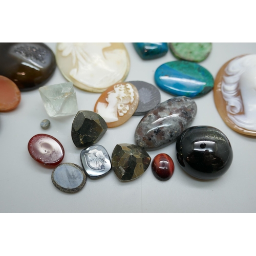 7150 - A collection of gemstones, carved shell cameos, pietra dura, etc., 425.6ct total