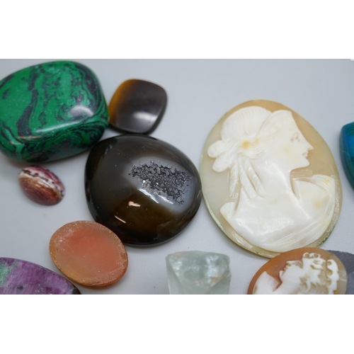 7150 - A collection of gemstones, carved shell cameos, pietra dura, etc., 425.6ct total