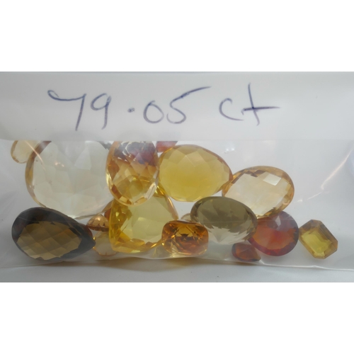 7151 - A collection of citrine gemstones, 79.05ct, and a small quantity of amber, 8.35ct