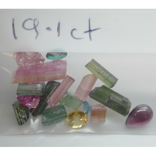 7152 - A collection of gemstones including tourmaline, 19.1ct, chromic diopside, 7.45ct, and grandidierite,... 