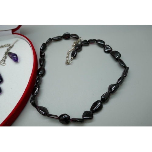 7170 - An amethyst drop necklace and an amethyst necklace with a silver clasp