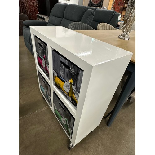 3053 - Four cube scooter storage cabinet on castors