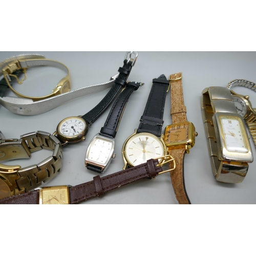 7185 - A collection of 26 wristwatches, and three watch movements including Omega and Garrard