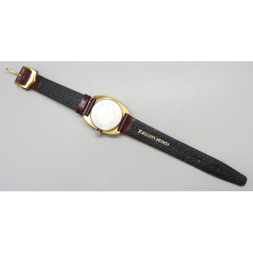 7201 - A Lanco digital wristwatch with leather strap, 32mm including crown