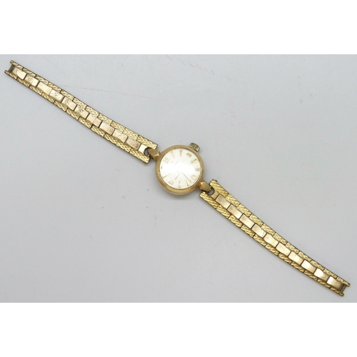 7203 - An Omega lady's wristwatch, strap lacking clasp, 20mm including crown