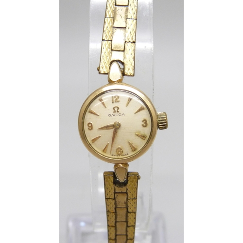 7203 - An Omega lady's wristwatch, strap lacking clasp, 20mm including crown