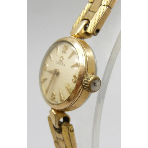 7203 - An Omega lady's wristwatch, strap lacking clasp, 20mm including crown