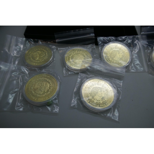 7240 - The Worth Collection, a pair of Queen Elizabeth II and Prince Philip Memorial sets, five medallions ... 