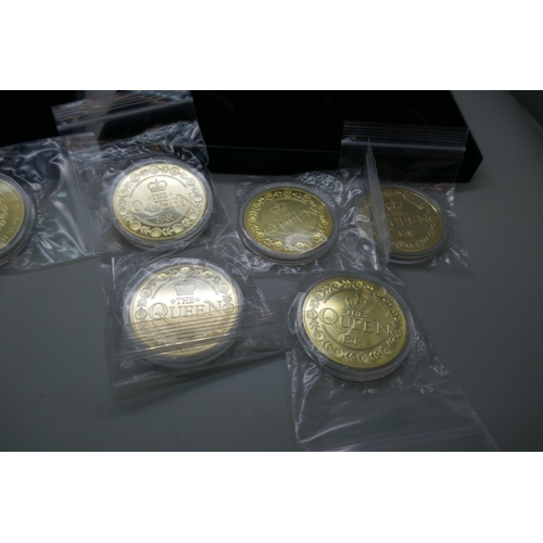 7240 - The Worth Collection, a pair of Queen Elizabeth II and Prince Philip Memorial sets, five medallions ... 