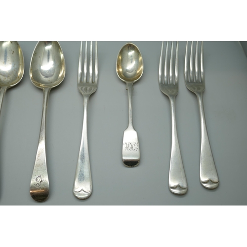 7247 - A silver dessert spoon, London 1828, 63g, other silver spoons and three forks, one spoon by Hester B... 