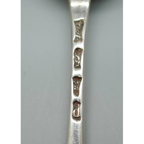 7247 - A silver dessert spoon, London 1828, 63g, other silver spoons and three forks, one spoon by Hester B... 