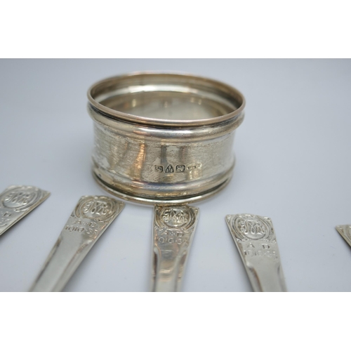 7248 - A set of six silver teaspoons, George V Silver Jubilee, and a silver napkin ring, 65g