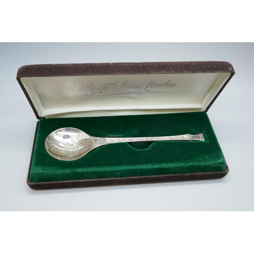 7249 - A silver 1976 John Pinches Christmas spoon, signed Peter Jackson, 28g, cased