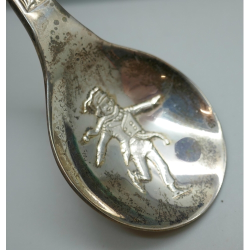 7249 - A silver 1976 John Pinches Christmas spoon, signed Peter Jackson, 28g, cased