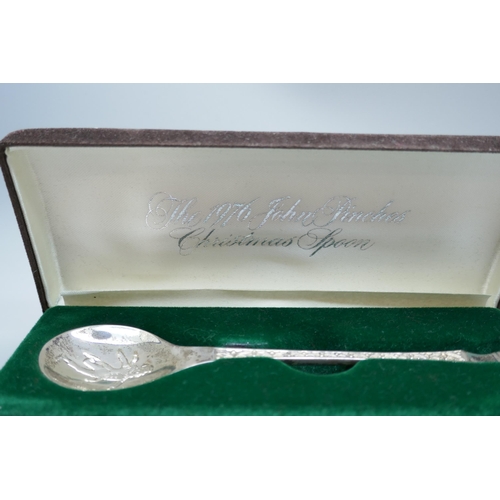 7249 - A silver 1976 John Pinches Christmas spoon, signed Peter Jackson, 28g, cased