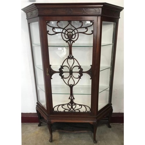 76 - An Edward VII mahogany splay front display cabinet