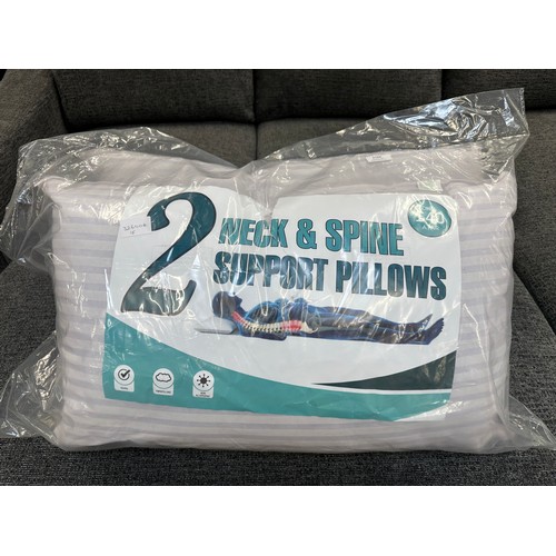 3184 - A pair of neck and spine support pillows