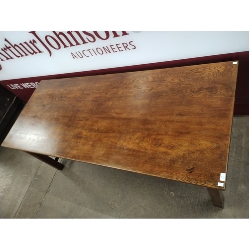 125 - An Arts and Crafts oak refectory table