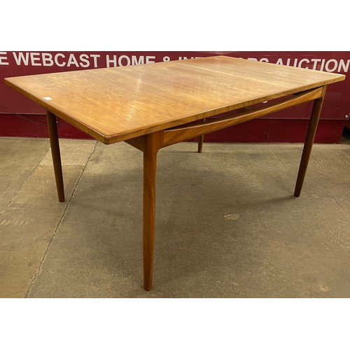 2 - A G-Plan Danish Design teak rectangular extending dining table, designed by Ib Kofod Larsen