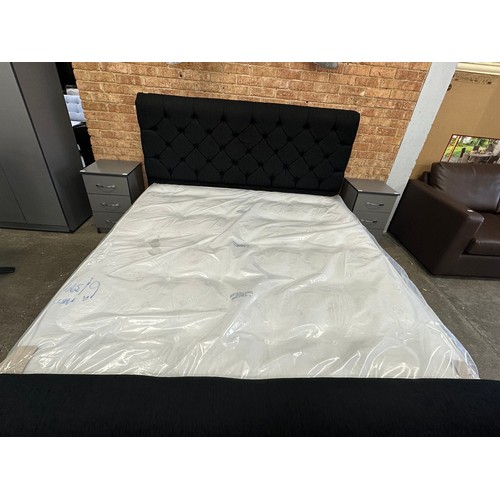 3172 - A black fabric buttoned superking size bed and mattress