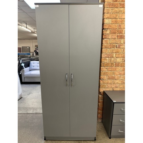 3173 - A grey two door wardrobe