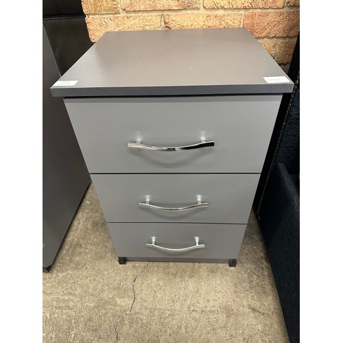 3174 - A grey three drawer bedside chest