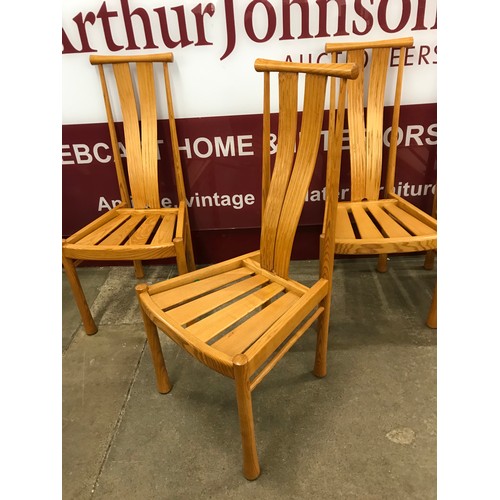 56 - A set of four Ercol Blonde ash Saville dining chairs