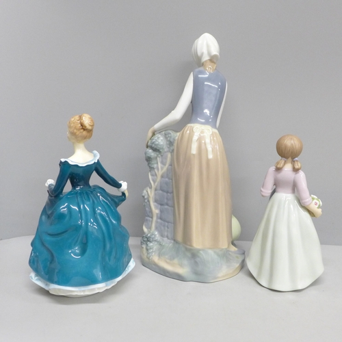 2007 - Three porcelain figures, Royal Doulton Janine, second quality, a large Nao figure and Sally by the R... 