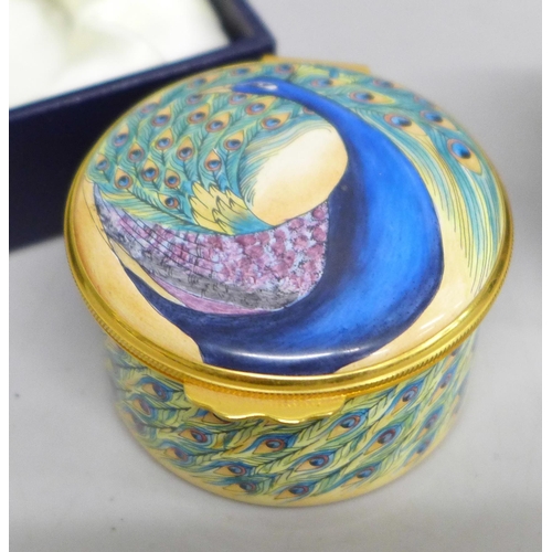 2013 - An enamelled Moorcroft miniature vase with lake scene and a similar pill box with peacock detail, bo... 