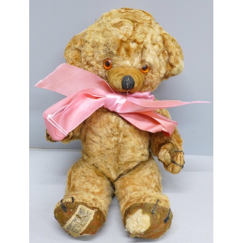 2019 - A vintage Merry Thought 'Cheeky Bear' Teddy bear with original bells in ears and label, circa 1958, ... 